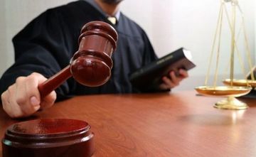 Keçmiş prokurorluq əməkdaşının cinayət işi məhkəmədə