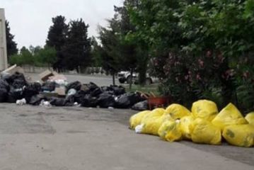 Rayon xəstəxanasında tullantıların küçəyə atılması ilə bağlı AÇIQLAMA