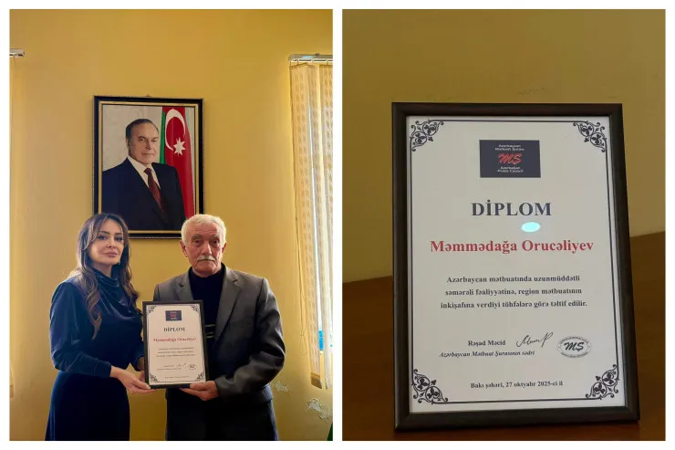 Deputat baş redaktora diplom təqdim etdi