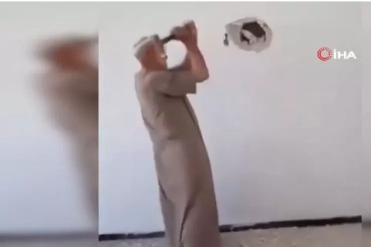 Əsəd rejimindən qorumaq üçün  kitablarını divara hördü – 15 il sonra geri qayıtdı   - VİDEO 