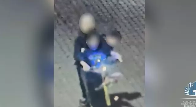 Bakıda təhlükəli ANLAR: bir skuterə minən 3 uşağın KAMERA GÖRÜNTÜLƏRİ